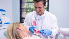 Close-up of a red light mouth device, a futuristic oral health tool designed to enhance gum health and promote healing through red light therapy.